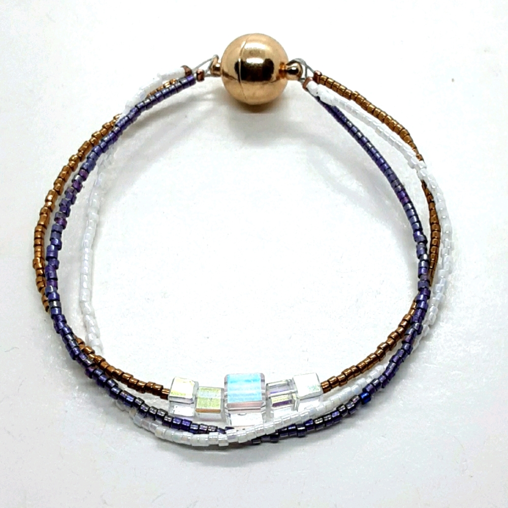 7.5 inch triple strand glass beaded bracelet
